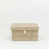 Isla storage box placed on a modern vanity table, holding jewelry and small accessories